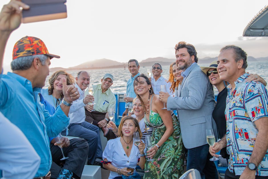A lively group of adults celebrating on a yacht enjoying a scenic view in Panama